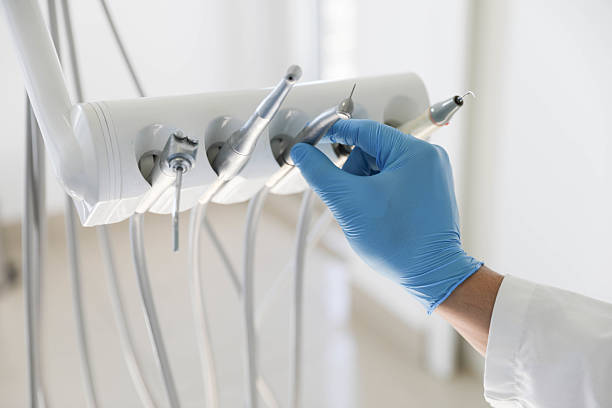 Professional Tooth Extraction technician working in Centreville, MI